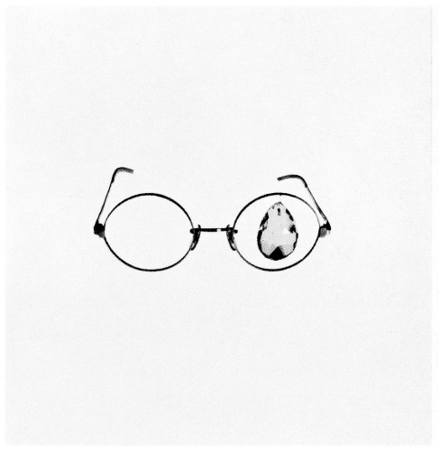 The glasses on the cover don’t exist. And yet, brochure